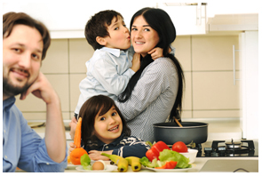 Family with two children in their kitchen